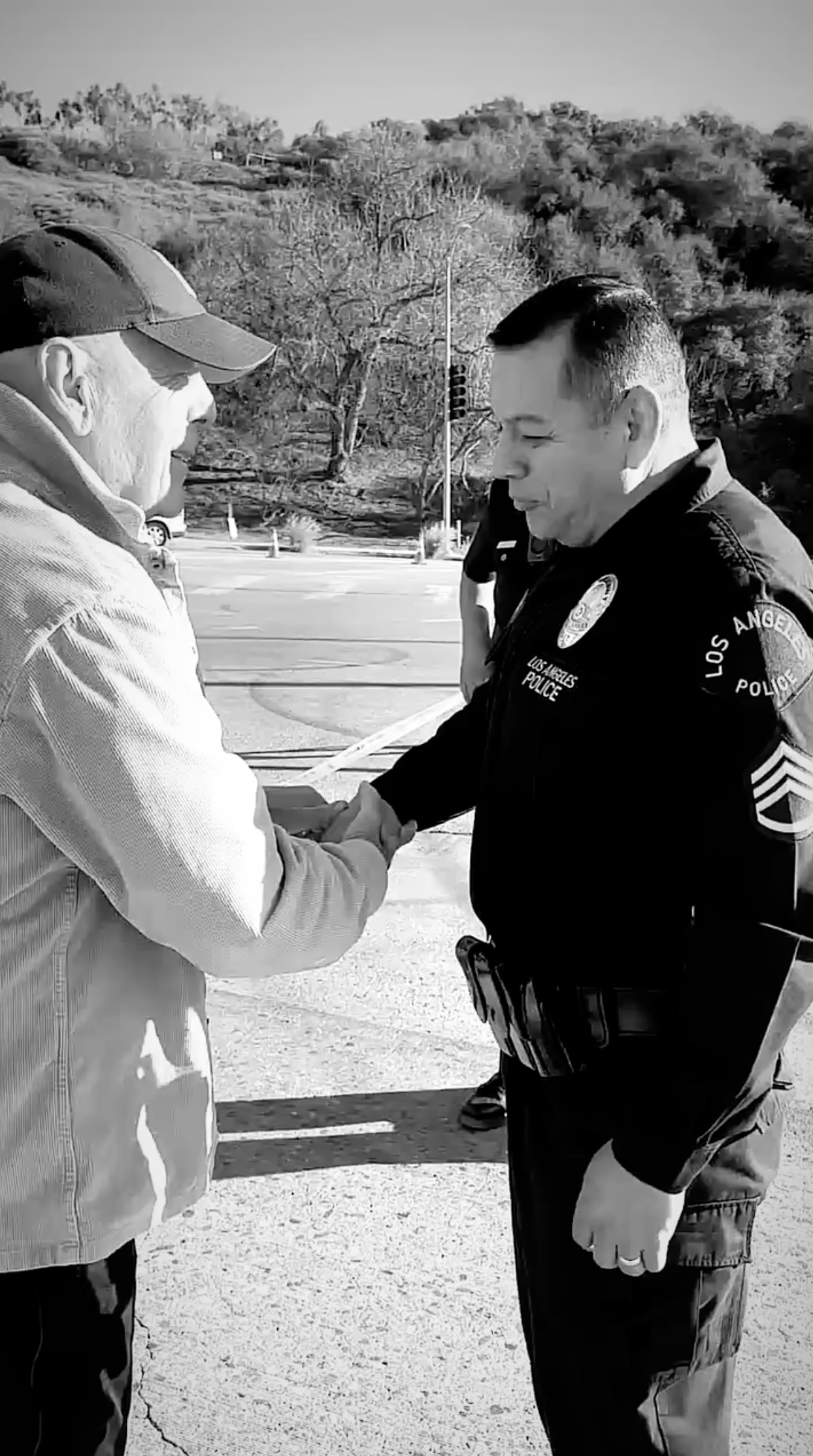 Bruce Willis and LA police officers in January 2025