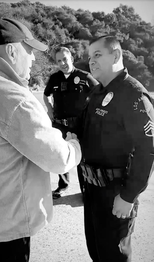Bruce Willis and LA police officers in January 2025