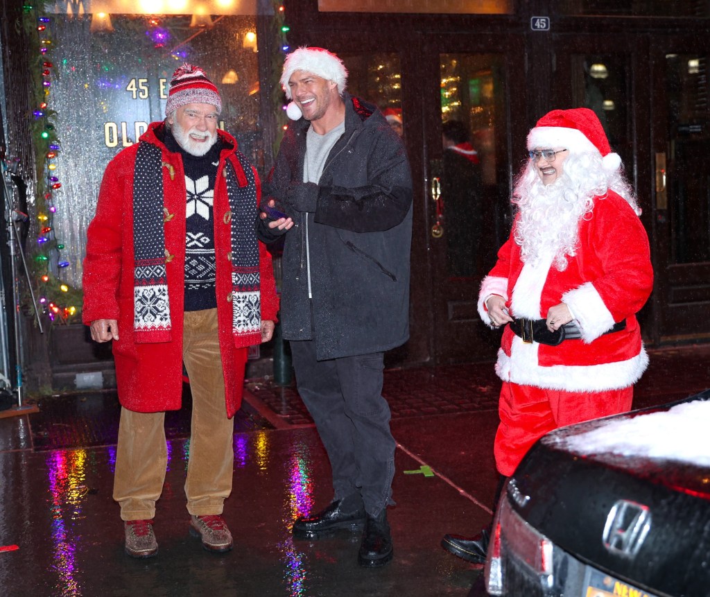 Arnold Schwarzenegger and Alan Ritchson are seen filming a Santa Con after party scene on the "Man with the Bag" movie set in NYC.