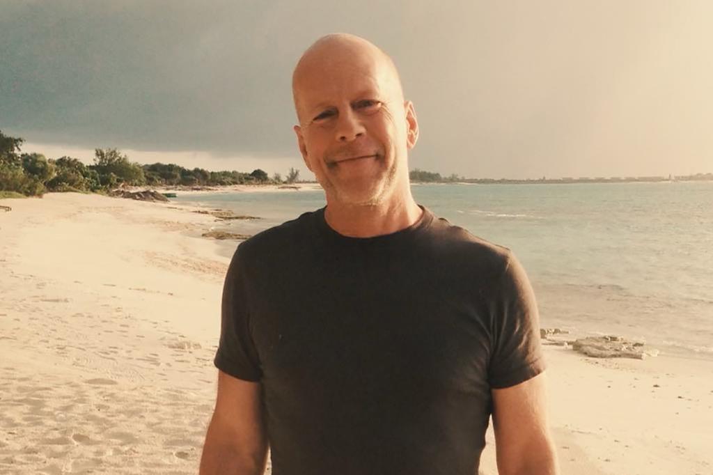 Bruce Willis on a beach