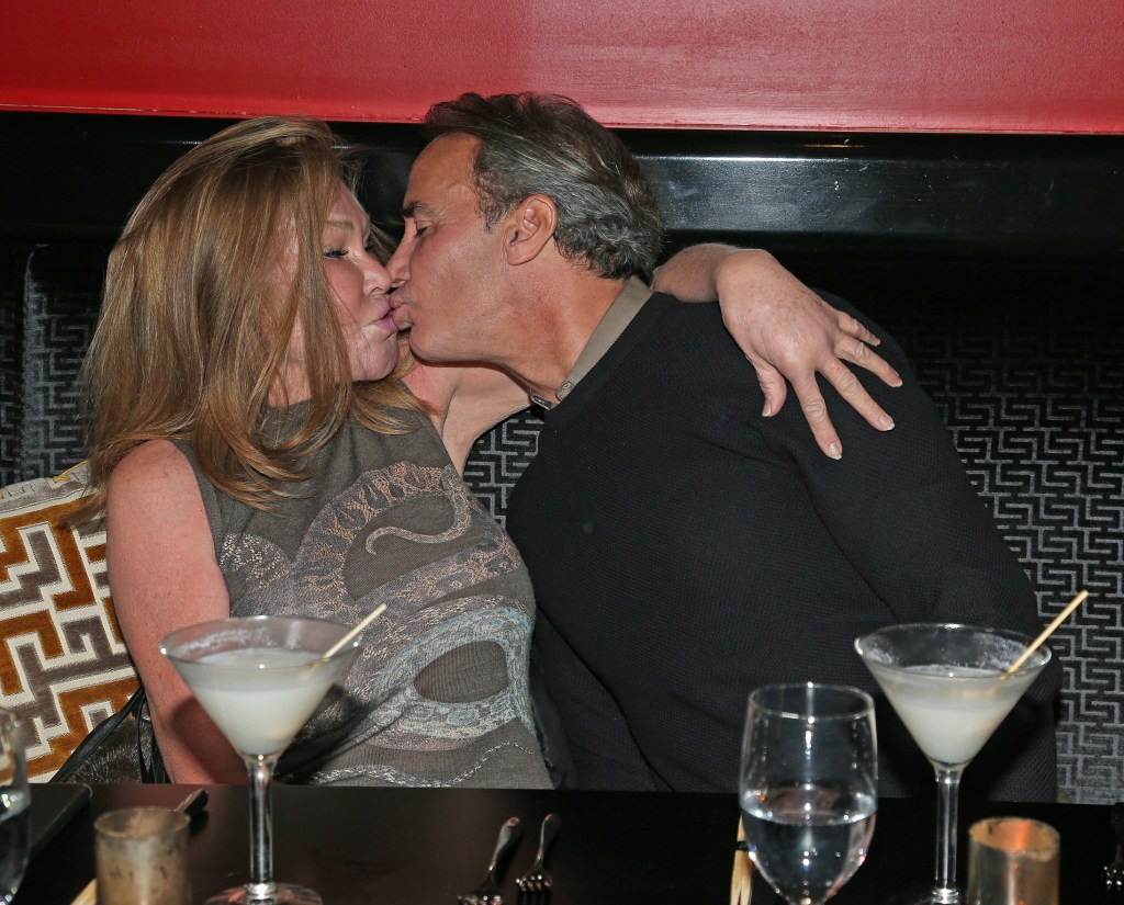 Jocelyn Wildenstein and Lloyd Klein share a kiss at  Philippe Chow restaurant.