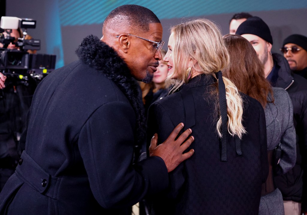 Jamie Foxx and Cameron Diaz catch up while walking the carpet at the "Back in Action" premiere in Berlin, Germany.