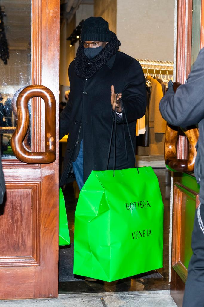 A$AP Rocky with shopping bags