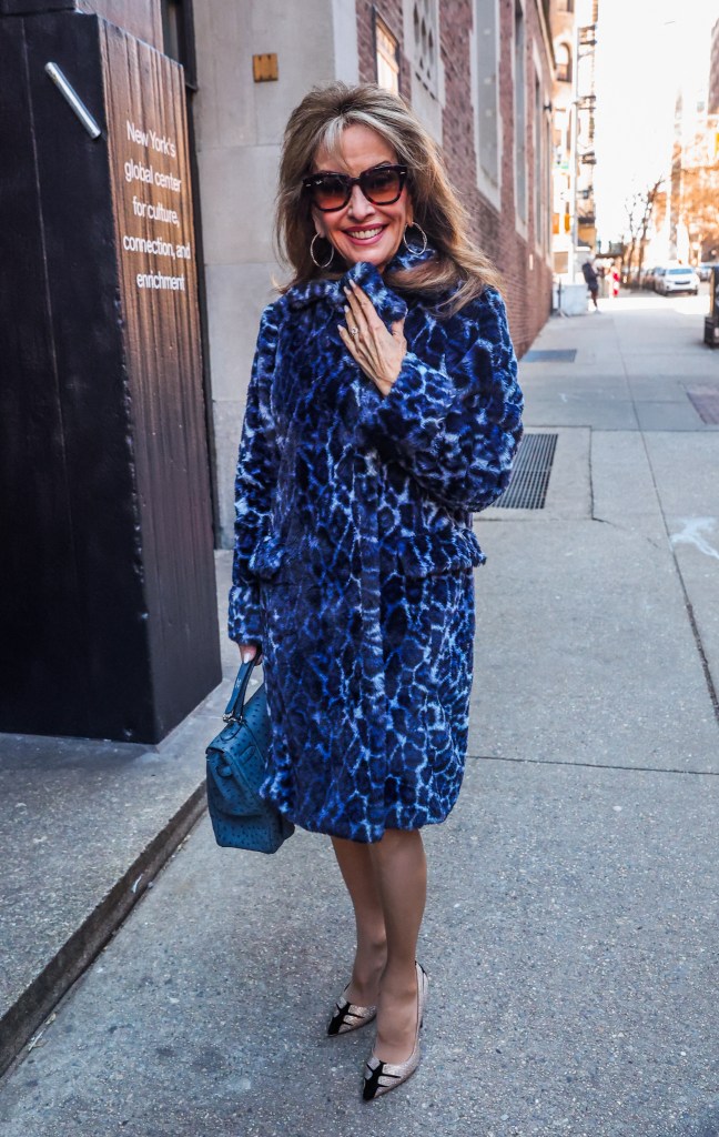 Susan Lucci heads to an event in a blue leopard jacket in NYC.